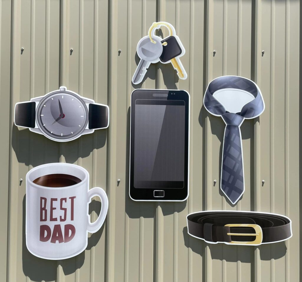 Coffee mug. tie. belt, keys watch , phone